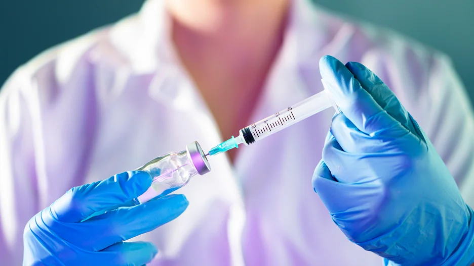 a provider prepares lip filler injection before the procedure
