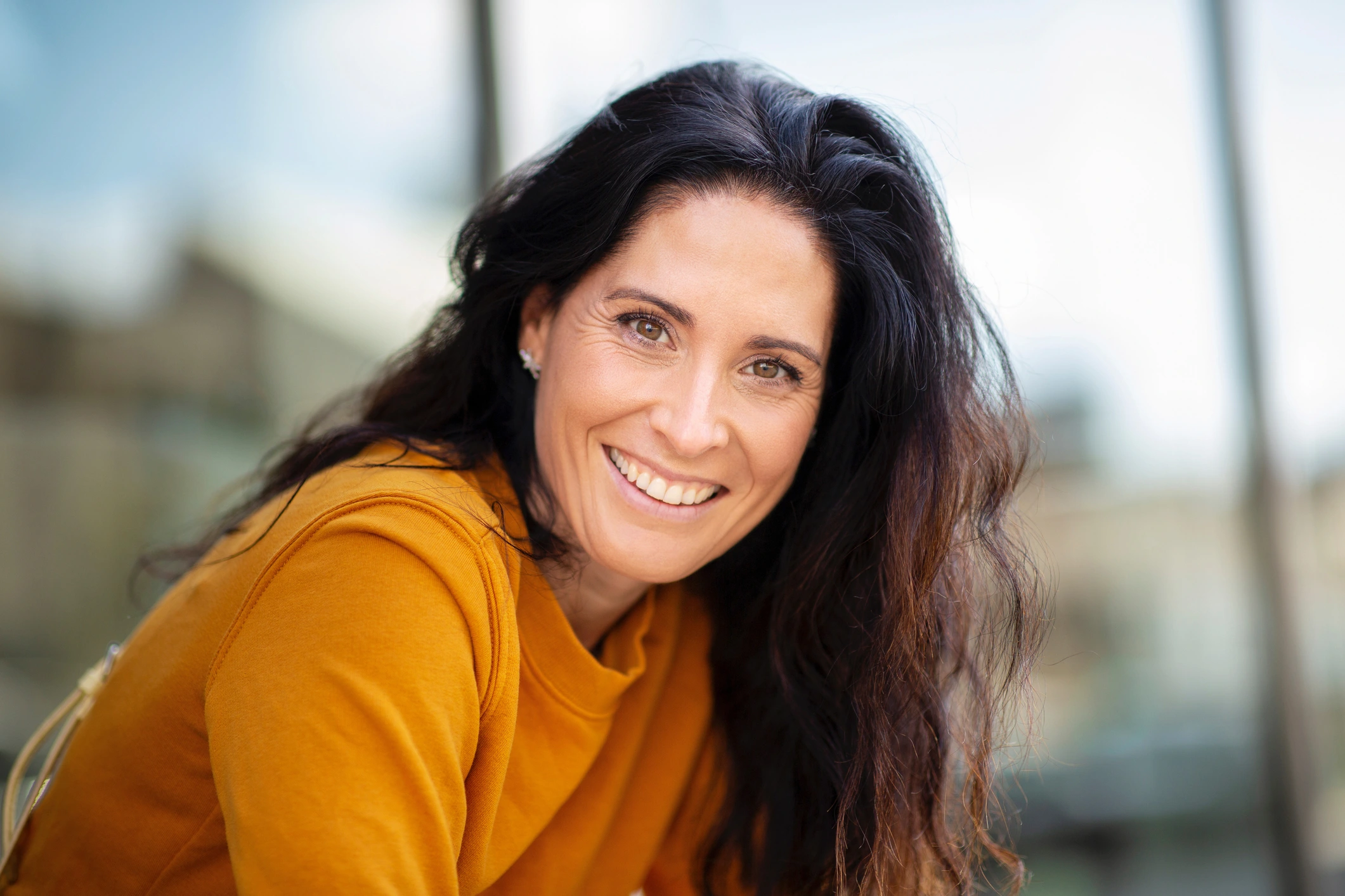 Hormone Replacement Therapy: woman smiling with a natural appearance